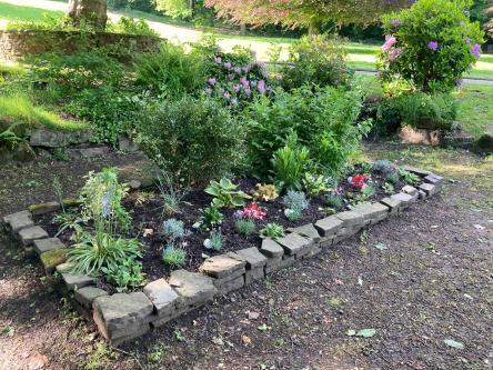  - Resurfacing to include path surrounding the parks sensory garden